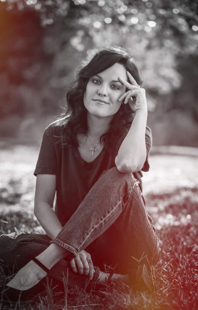 Randi Tisdall sitting on the grass at church | Christian mental health 
